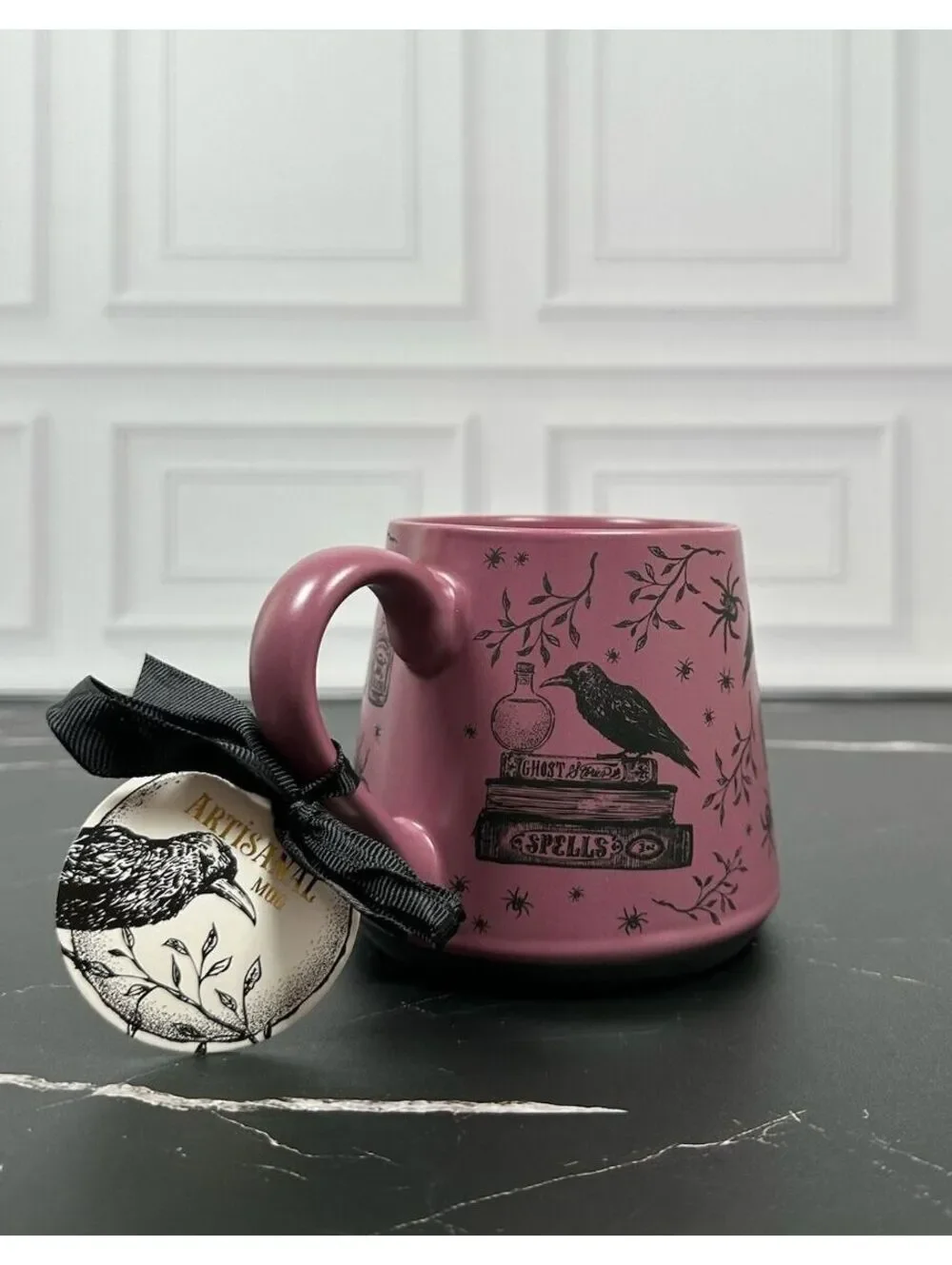 Connecting on Paper 2021 co. Crafted Ceramic Mug with Raven and Spellbook Design